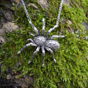 Pumpkin Patch Tarantula necklace, sideways facing, modelled in Sterling Silver by Emma Keating